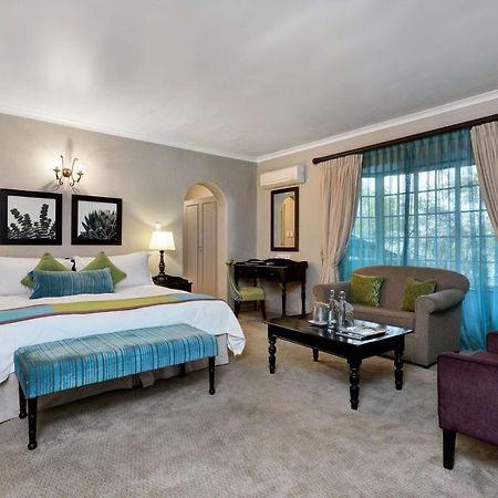 Mount Grace Hotel & Spa Магалисбург Екстериор снимка A bedroom at the Taj Bengal